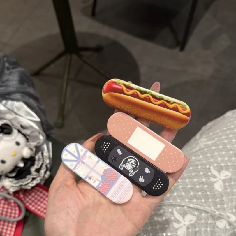 Bandage - حامل هاتف لاصق بتصميم هوت دوغ
